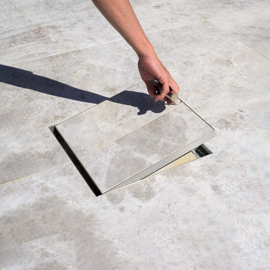 using a HIDE Safety Key to lift open the HIDE lid
