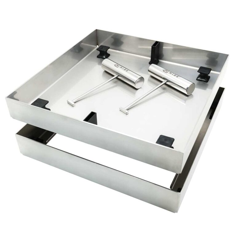 HIDE Concrete Cover raw hardware, showcasing the frame, lid with black concrete lugs and two HIDE safety keys.