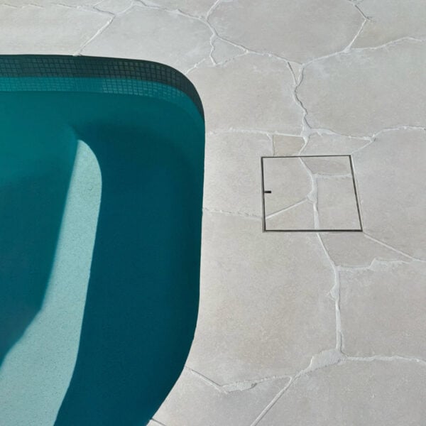 Stainless Steel HIDE Access Cover with grey crazy pave inlay.