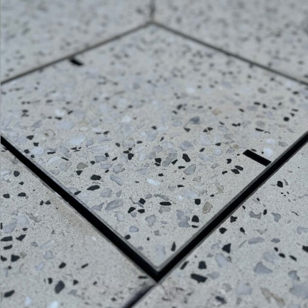 HIDE Drain Cover with honed concrete inlay.