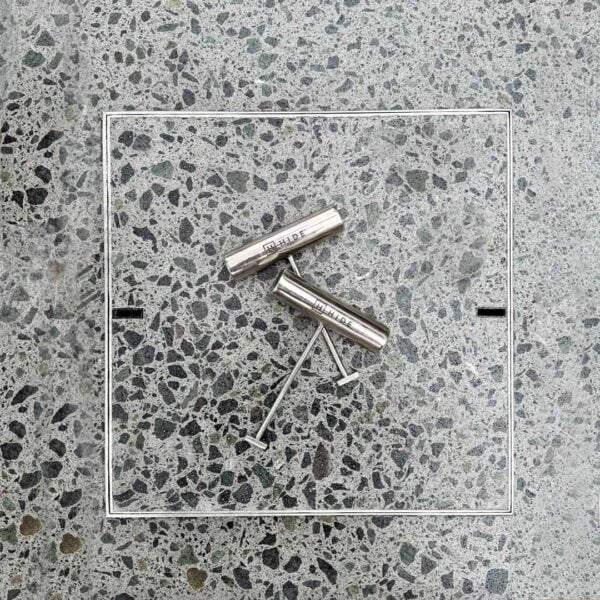 HIDE Concrete Cover with exposed honed aggregate inlay finish.