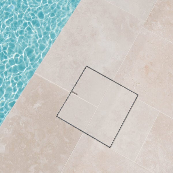 HIDE Skimmer Cover with cream tile pattern running through cover to create a seamless finish.