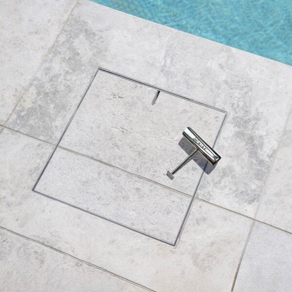 HIDE Skimmer Cover with grey tile inlay, tile pattern is running through the HIDE Cover to create a seamless finish.