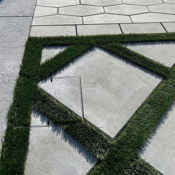 HIDE Skimmer Cover with artificial turf and concrete paving inlay.